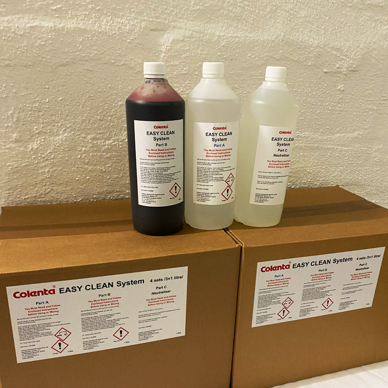 Product picture of three bottles of Colenta EasyClean system placed on top of its packaging box